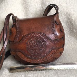 Vintage 1970 tooled leather purse. Authentic large
